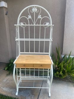 Selling a 5 tier metal bakers rack in great condition, vanilla color, very sturdy