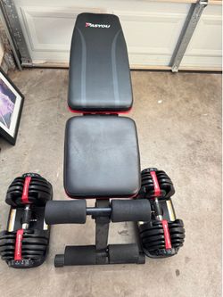 Bow flex adjustable dumb bells with bench