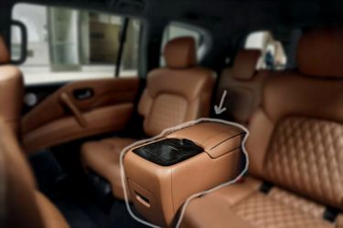 22-24 QX-80 rear center console in Saddle Brown ( never used )