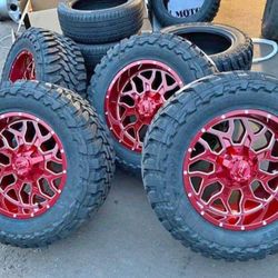 20x10 Candy Red Rims And Tires 33/1250/20 MT