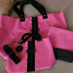 New - Set with Tote, Crossbody and Toiletries Case.