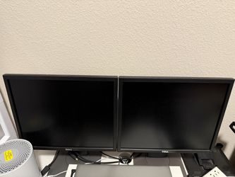 Pair of Dell desktop monitors black dual screen