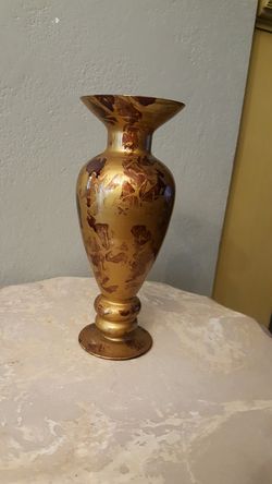 10 in tall gold and brown, looks a little gold and cranberry, vase decor art