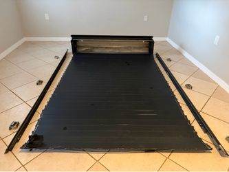 Retrax- For Ford F(contact info removed) or matching models Retractable bed cover 8” long