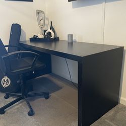 Darkwood desk plus rolling Office chair - clean modern setup