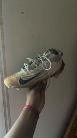 White n gold Nike vapors