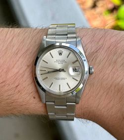 Rolex OysterDate 34mm stainless steel oyster bracelet smooth bezel silver stick dial 1500 watch box tag appraisal