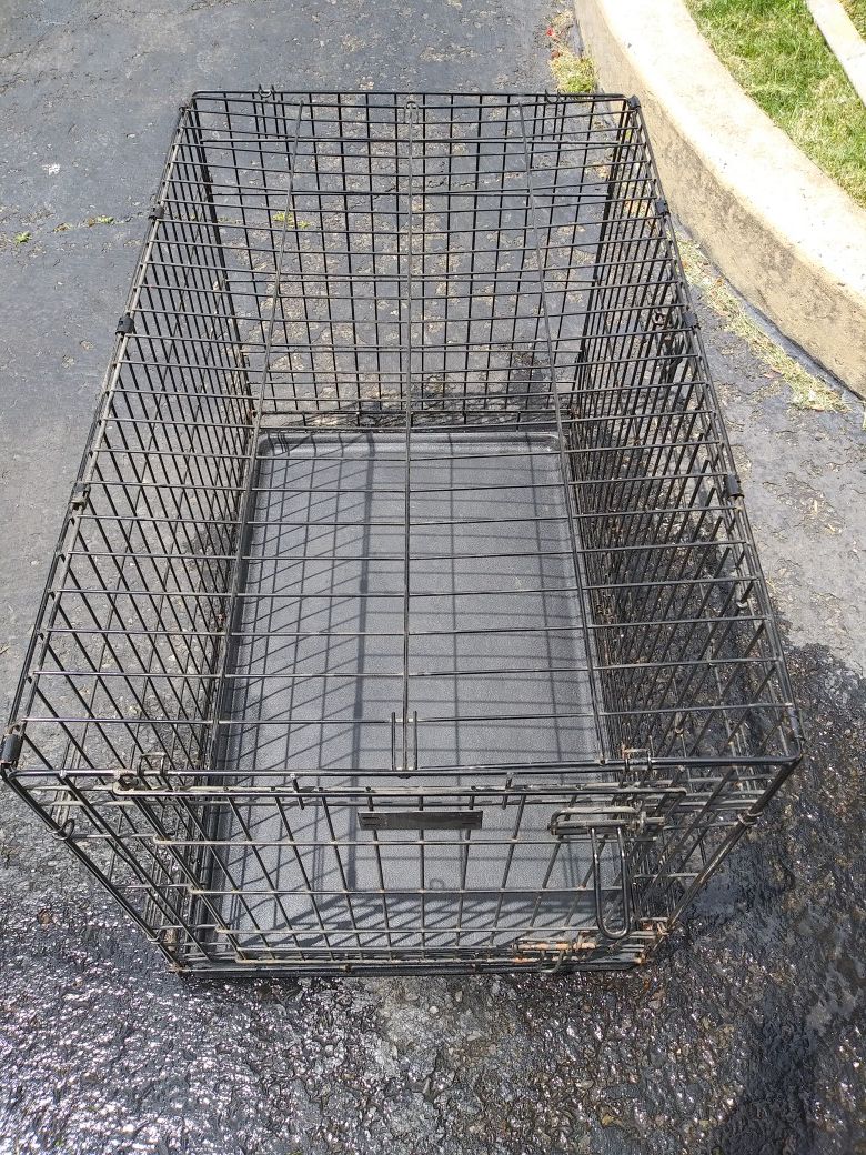 Dog cage with tray