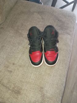 Black white and red Jordan ones low