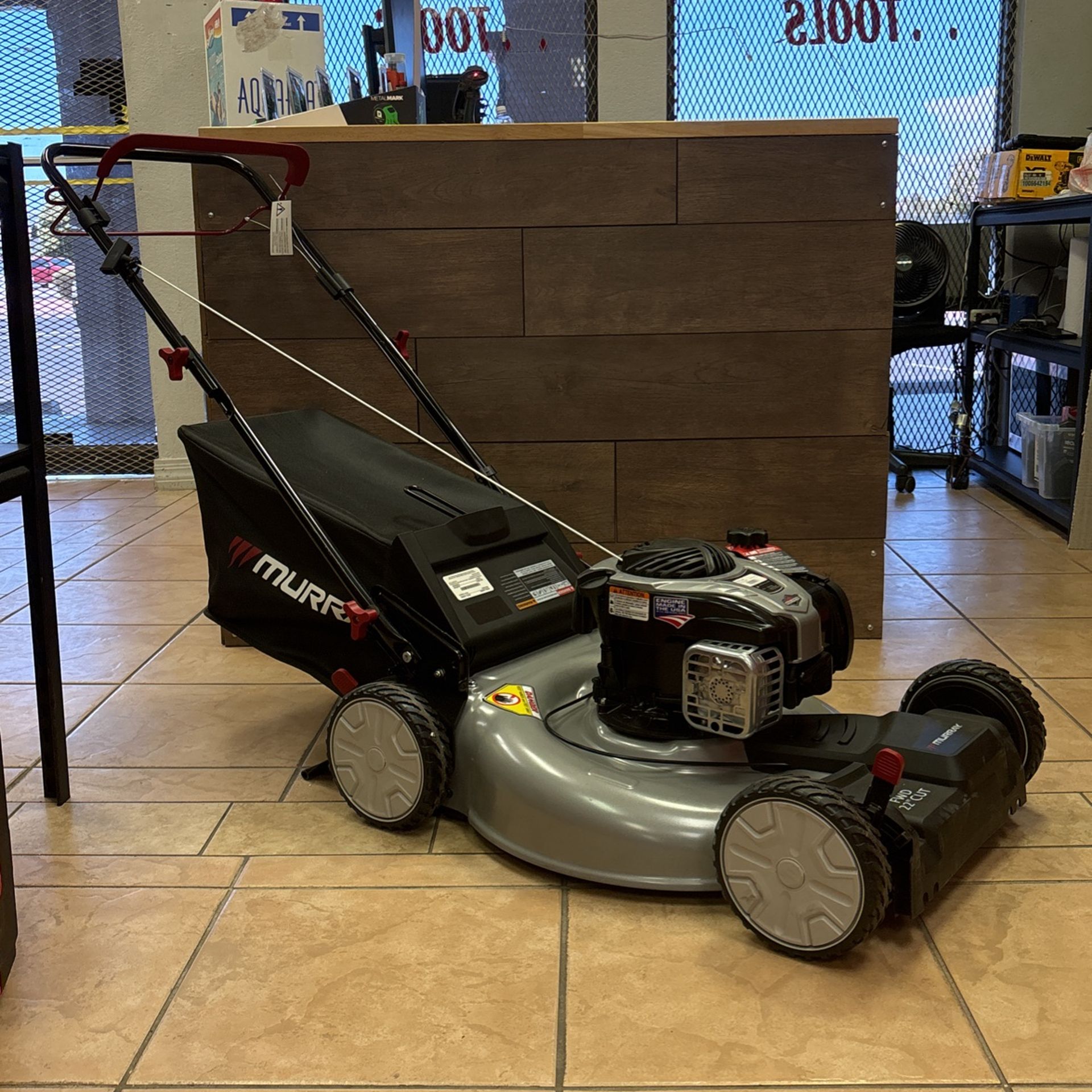 Murray 22 in. 140 cc Briggs & Stratton Walk Behind Gas Self-Propelled Lawn Mower with Front Wheel Drive and Bagger