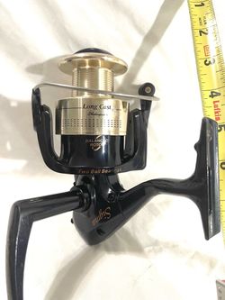 Like new hardly used medium-Heavy action Shakespeare, long cast spinner fishing reel