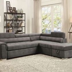 Brand New Gray Sectional with Sleeper and Ottoman