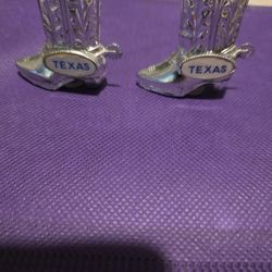 New cowboy boots Texas metal small salt and pepper shakers. Color: Silver. Decor, cook out, man cave, drinks, shots.

Pickup East side El Paso 