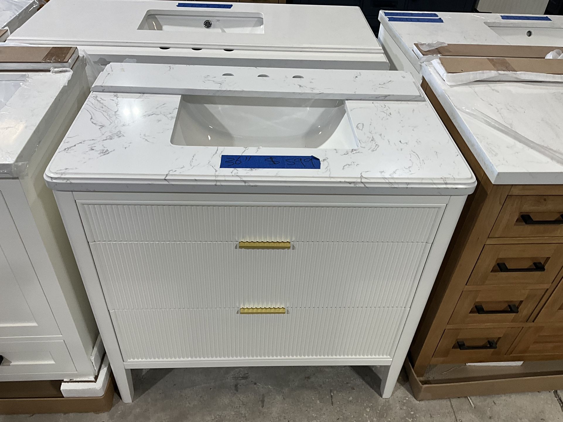 36” Bathroom Vanity in white , single sink soft close solid wood with vanity top in white $599 Luke’s liquidations warehouse Address: 2434 N Forsyt