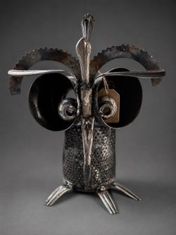 Scrap metal owl lantern