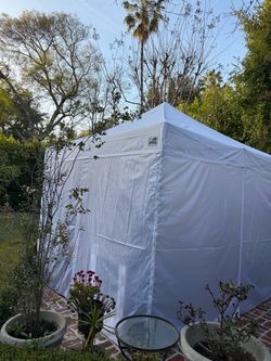 Eurmax 10x10 pop up tent/ canopy with side walls, sand bags, etc