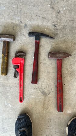 Mini sledge… pipe wrench… pick hammer.. wedge hammer