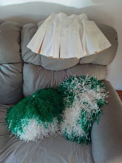 Cheeri g skirt and pom-poms
