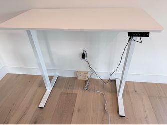 Electric standing desk and chair