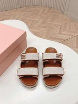 Miu Miu canvas slides