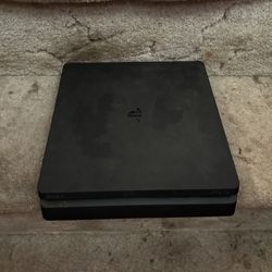 PS4 with accessories 
