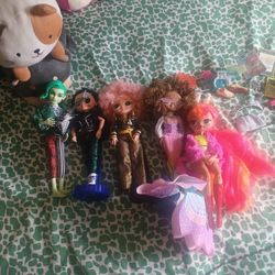 Asorted Dolls And Accessories 