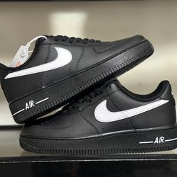 A pair of black Nike shoes