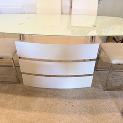 Glass dining table with 6 leather chairs
