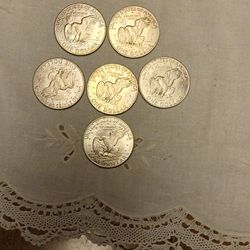 7 Eisenhower Dollar Coins – $10 Lot