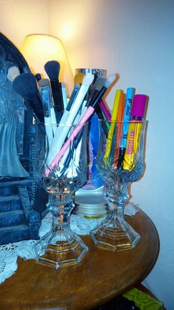 Makeup brush holders