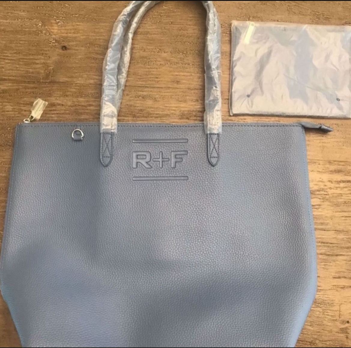 Rodan and Fields faux leather large bag. Brand new