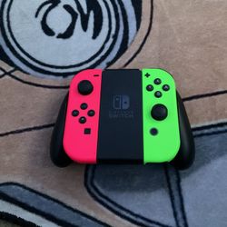Pink And Green Joycons With Grip Holder