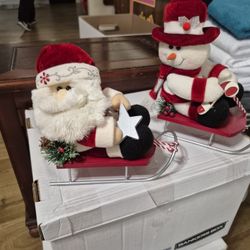 Santa &Snowman In Sleds