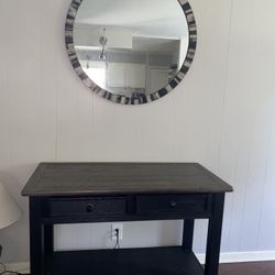 Console Table and Ellford Accent Mirror This new one is from the Ashley brand