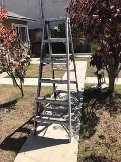 6’ Aluminum ladder can be used on both sides asking 75.00 Dollars - “and no less “