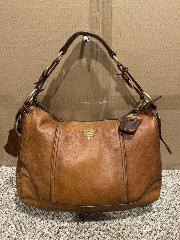 𝐏𝐫𝐚𝐝𝐚 Large Deer Skin In Brown Leather Bag