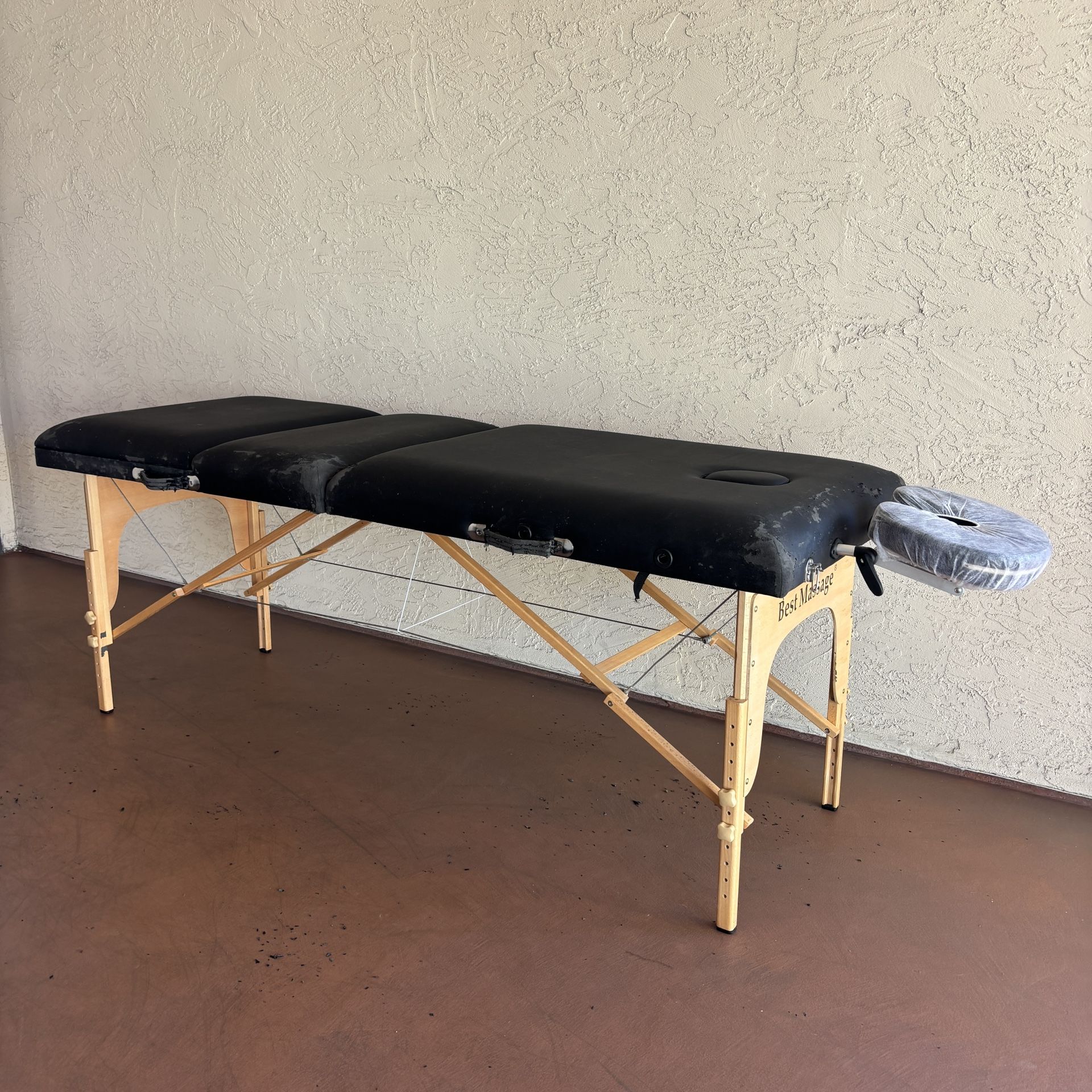 One Black Massage Table With accessories and Black Carrying Case