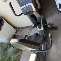 Free motion recumbent exercise bike