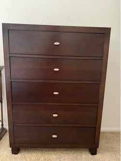Wooden 5 drawer dresser. Price negotiable!