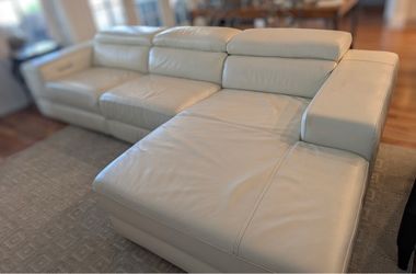 Leather sectional sofa with electric recliner and chaise lounge