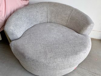 Beige round swivel chair