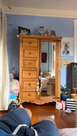 Gorgeous wood armoire with mirror and shelves
