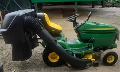 JOHN DEERE 42" DECK 18HP KAWASAKI ENGINE.