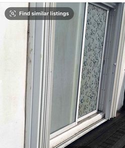 According hurricane sliding door shutters