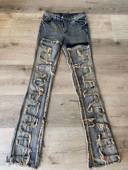 Heavily Distressed Flare Stacked Jeans