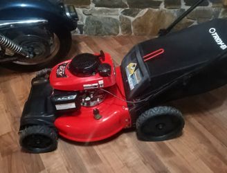 Troy bilt 21 " 5.5 h/p Honda high wheel self propelled mower with bagger