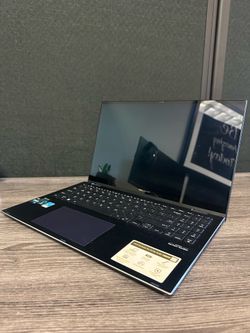 Asus Zenbook Pro 15 Flip OLED Q529Z – $210