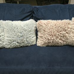 4 Plush Pillows