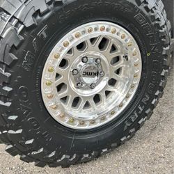17" kmc KM235 Granade w/ 35" Toyo MT Tires