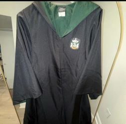 Universal Studios Slytherin coat, Size Small, VERY OVERSIZED and wand!!
